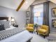 Gray and yellow master bedroom